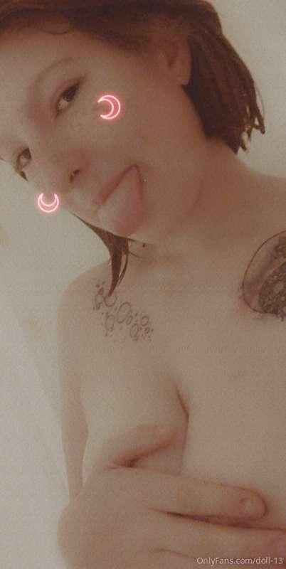 Unlock to see me dancing in the shower, a full body shot, an..