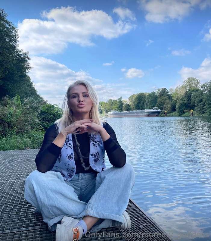 🌊 Serenity, style, and a little sass 💋 Sitting by the water,..