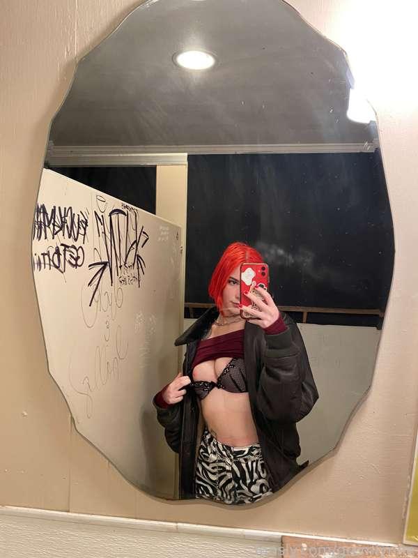 A lil nipple flash in the bar bathroom 