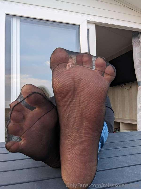 Feeling the air through my nylons, cooling my sore, hot sole..
