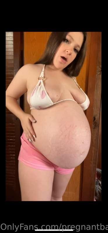 Standing in front of you POV, rubbing my belly and show off ..