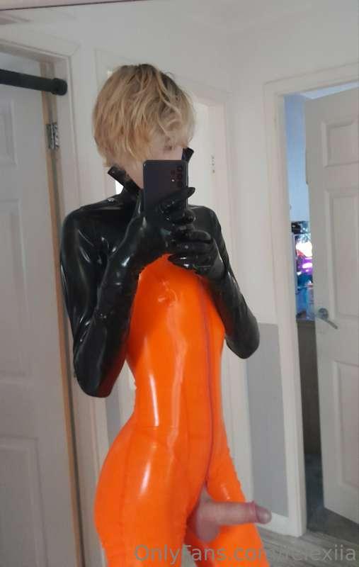 This orange latex suit and bolero makes me feel things 👉👈  a..