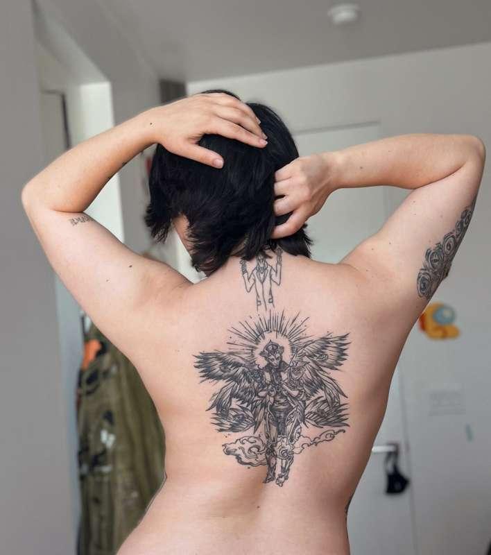 if u know what my back tat is u are cool and based