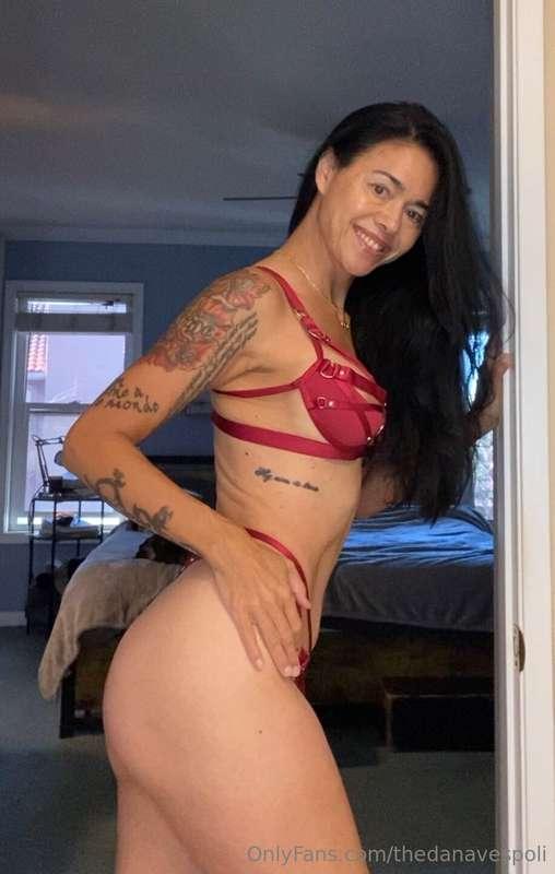 Not wearing much… but wearing just enough to make you wanna ..
