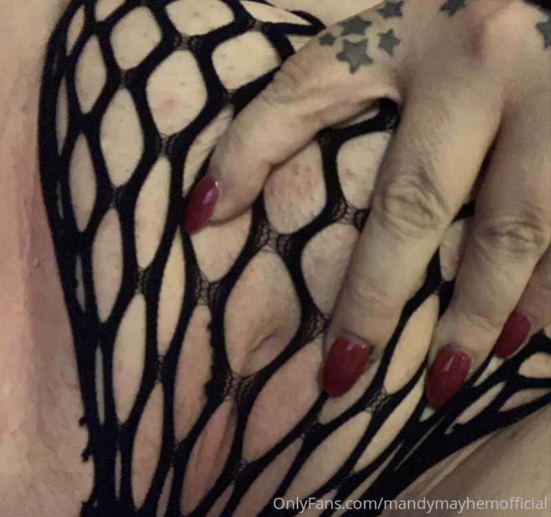 My pussy feels so good in fishnet panties.