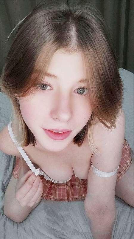 A sweet blonde with ***natural breasts and nipple piercings*..