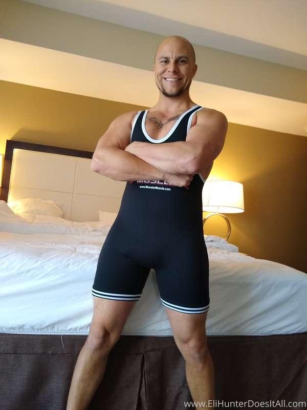 Check out how I look in this wrestling singlet. I wonder if ..