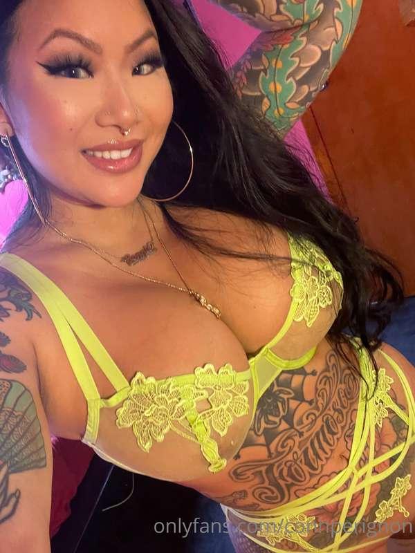 Tattoos tell the story… but the lingerie starts the conversa..