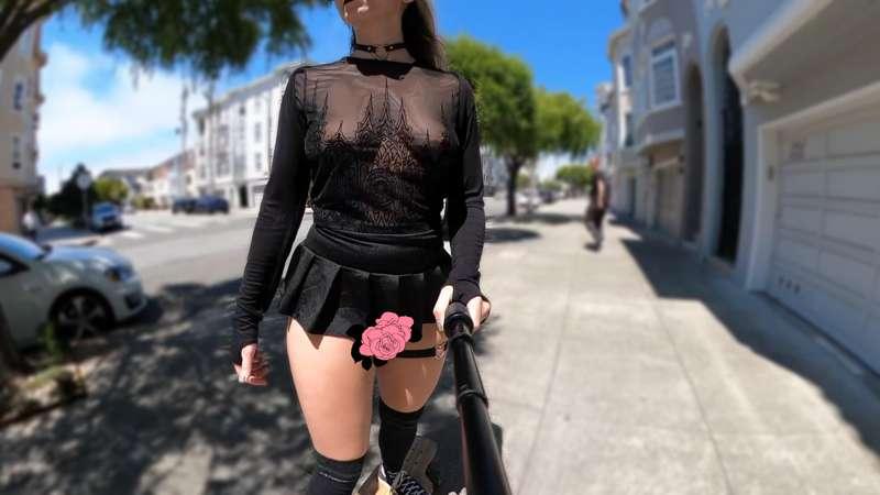 Longboarding in a mini skirt and a sheer shirt! 