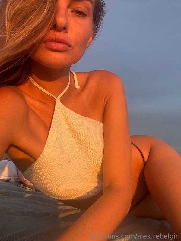 The sun melts on my lips, and you're still on the other side..