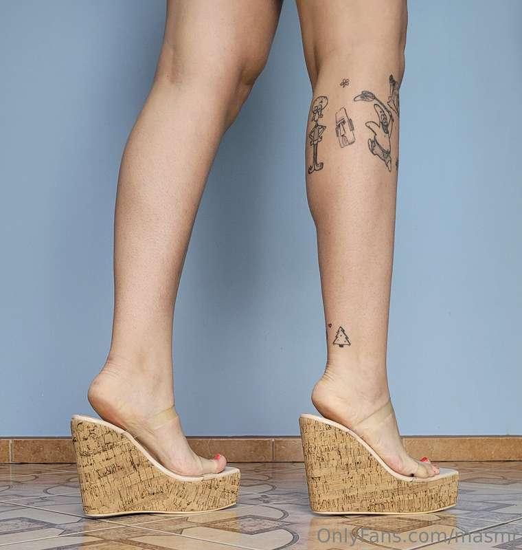 Cork wedges, jean shorts and legs.