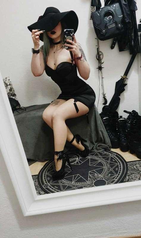 Black, short and tight. This dress really showing off my cur..
