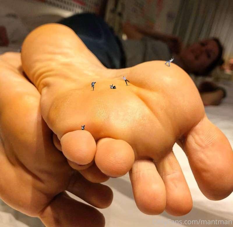 Kate laughs as their tiny foot steps tickle her soles. She f..