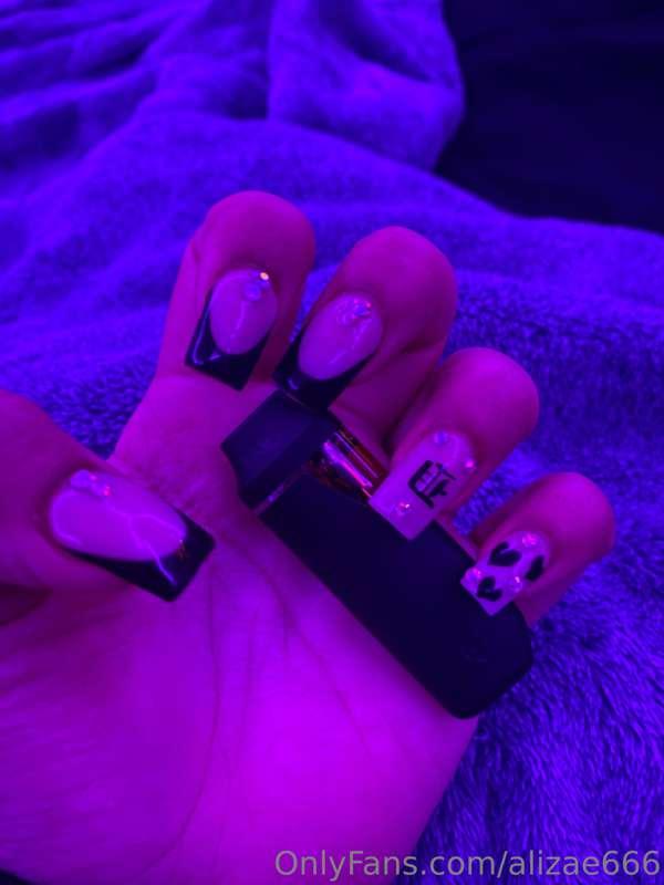 Got my nails done but I hate them but the lady liked them an..