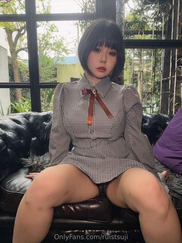 A combination of plain clothes and lingerie with lots of str..