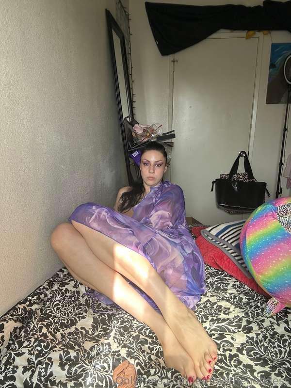 Bored on my bed, Laying down shoving my feet into the camera..