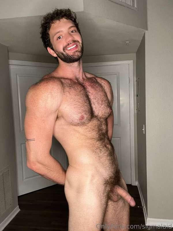 All natural cut 6’8 otter smiling down at you with his prett..