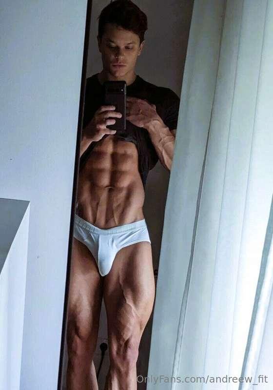 Shirt lifted, abs tight, cock thick and hard in my brief… yo..