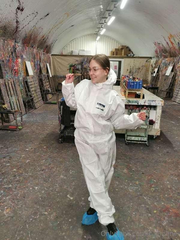 Fooling around and painting walls with paint in a chaotic wa..