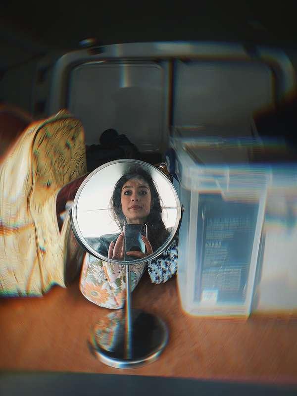 The back of this van is my changing room and makeup station.