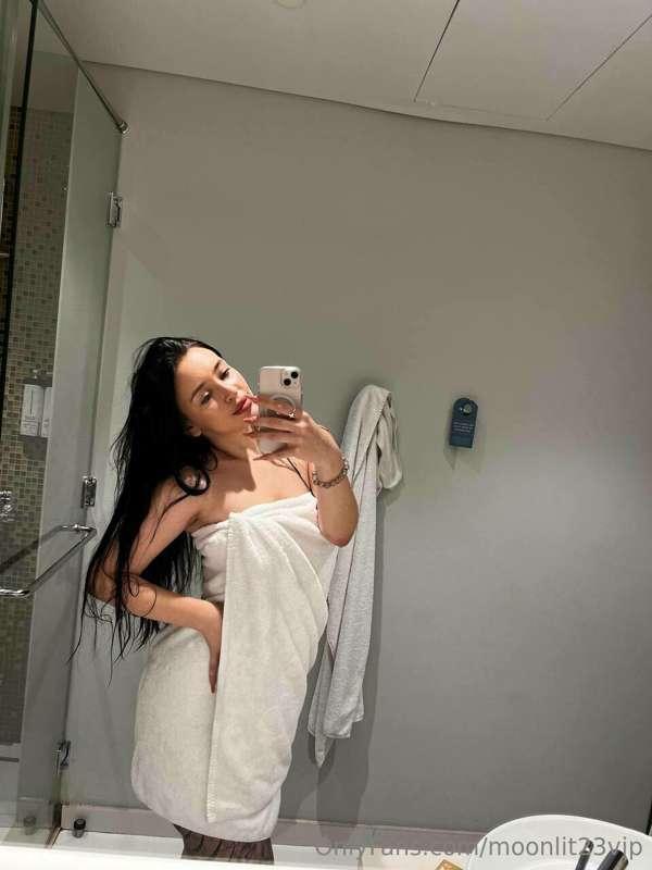 Fresh out of the shower, this towel is the only thing standi..