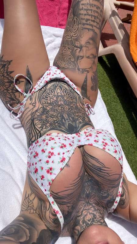 Slip your hand into my bikini bottoms and touch my wet pussy..