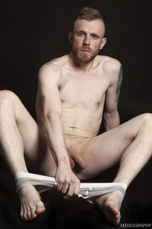 Phil Rider takes them off to reveal his big uncut cock