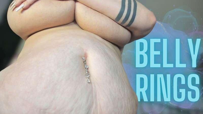 In this custom video, I am trying on fake belly rings. I try..