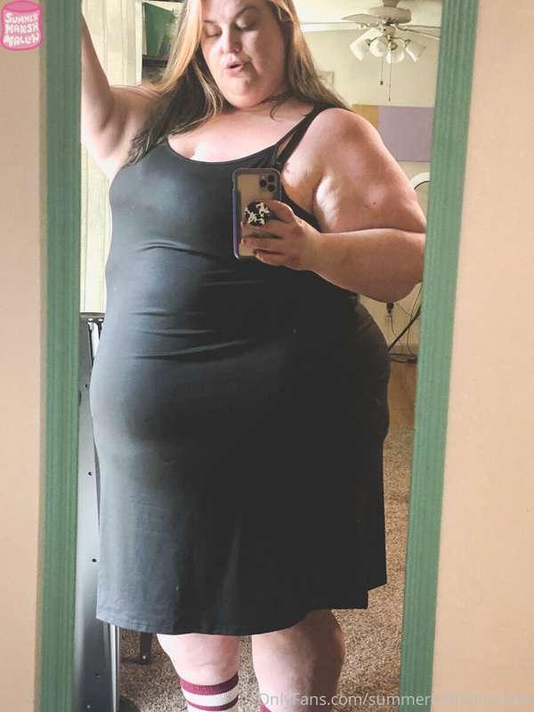 Even when the dress hangs this long, my belly still peaks ou..