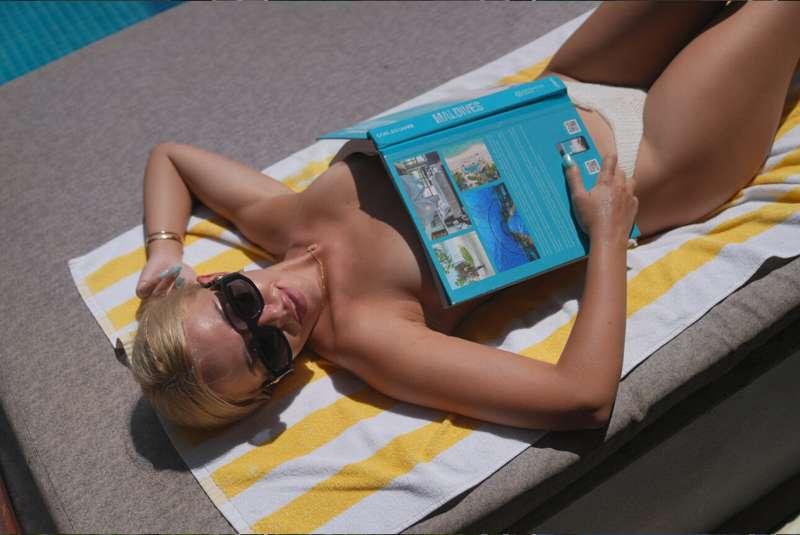 Sun, shadows and secrets... ☀️🕶️I hide behind this magazine,..