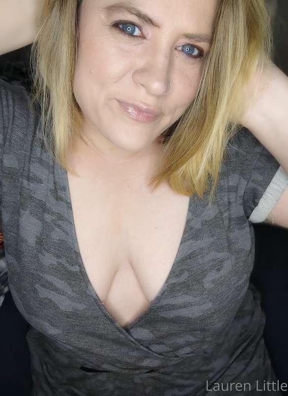 Unlock to see me sitting on my bed in nothing but panties. 
..