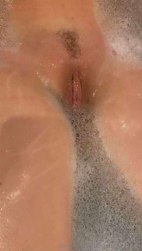Letting the bubbles lap at my pussy as it gets wet. Who want..
