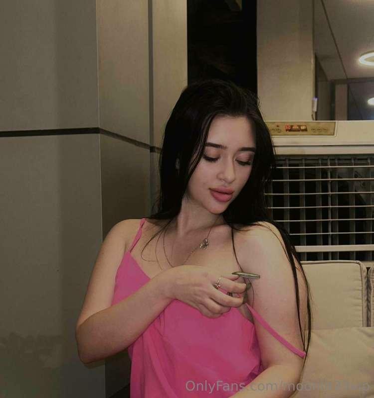 The soft silk of my pink dress fits perfectly to the body, l..