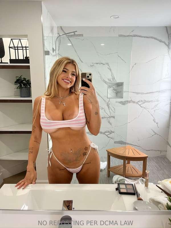 Would you grab these juicy tits gently or rough? I won't min..