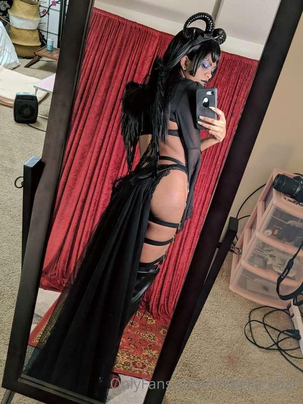 Villainous woman shows you her butt, call that a bad ass.