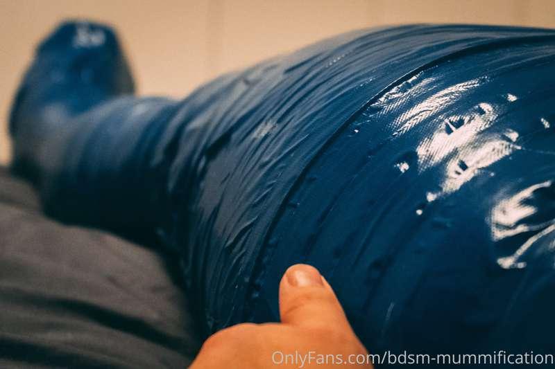 Duct tape self bondage, what a nice restricted feeling. More..
