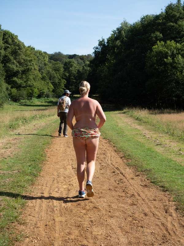 Just as I start to stip off walking down the path, a man com..