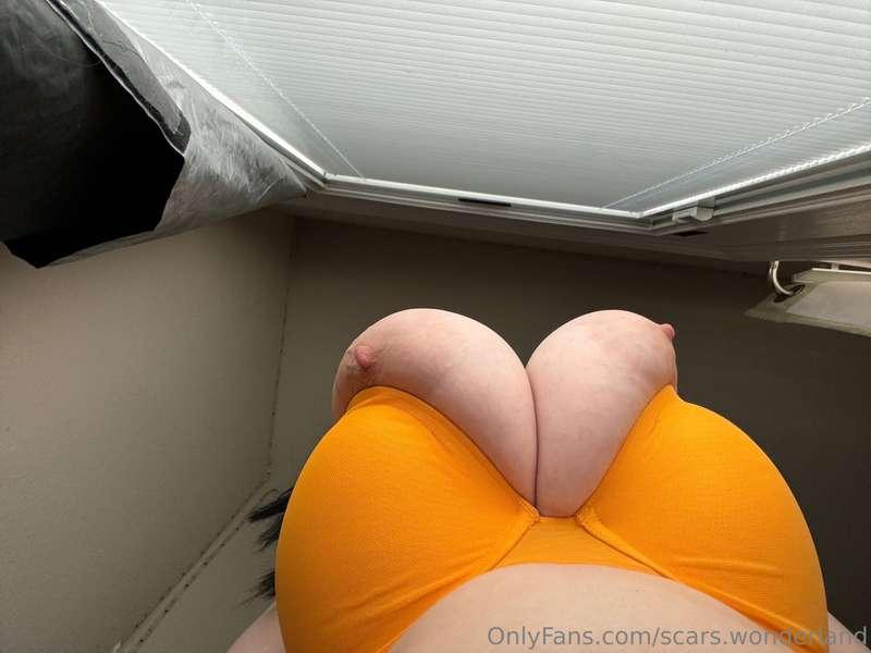 Squished under titty 😋