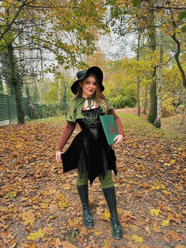 Wandering between the trees with my spellbook, ready to cast..