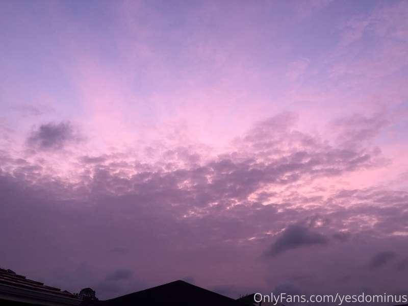 Rose gold sky reflecting on my skin and the Symbols of my lo..