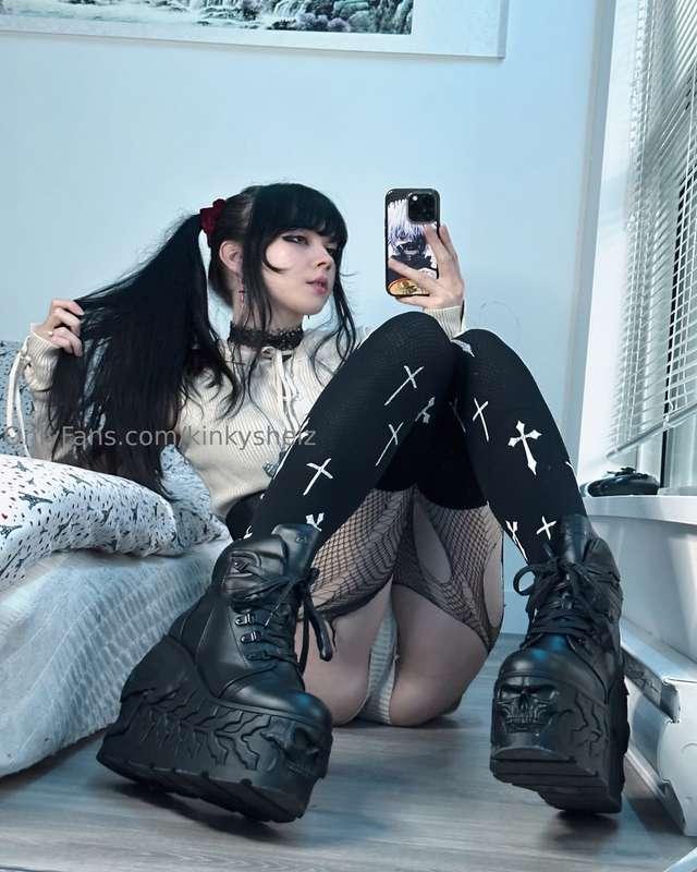 More content with these ripped fishnets and with the boots o..