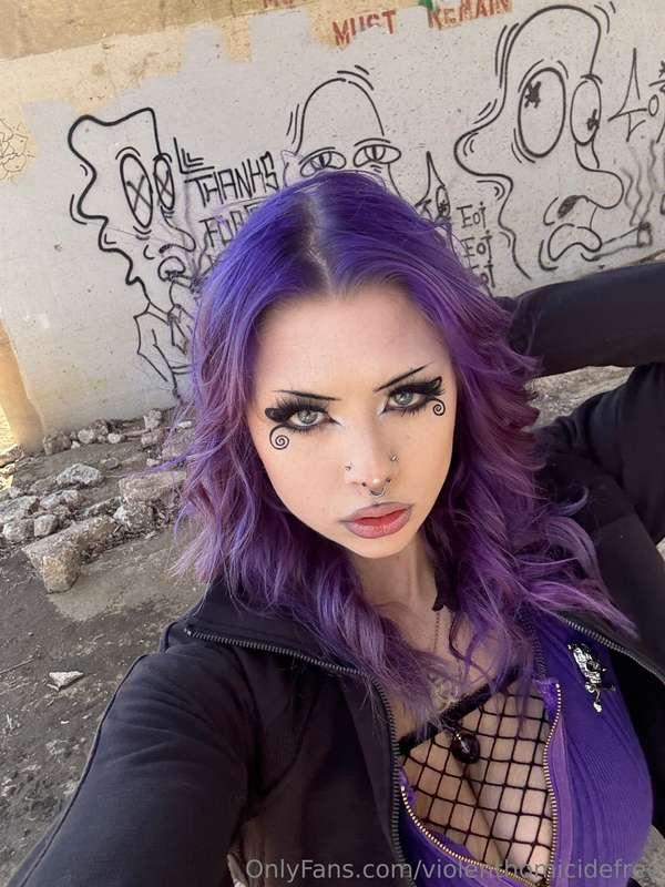 The graffiti behind me is saying something deep, but I’m jus..