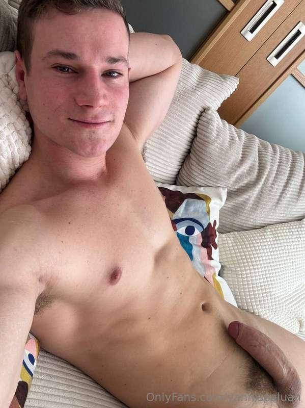 Lying down fully naked, my big, fat cock proudly on display ..