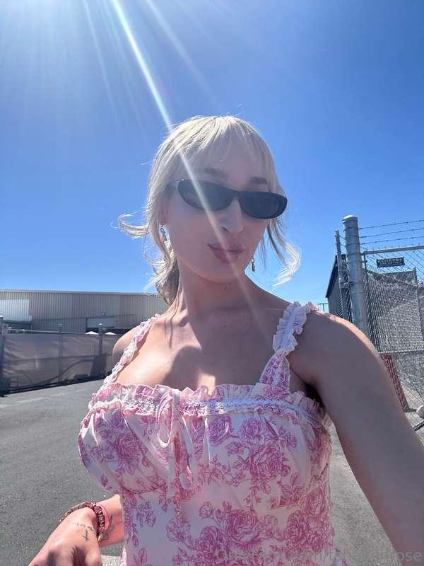 Chilling through the sun with flowers in my dress and joy in..