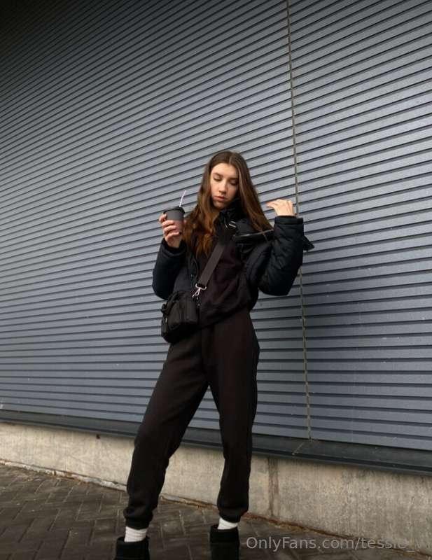 Strolling through the day draped in chic black, where every ..
