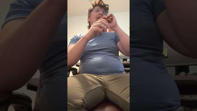 Demolishing a pizza in tight clothes 