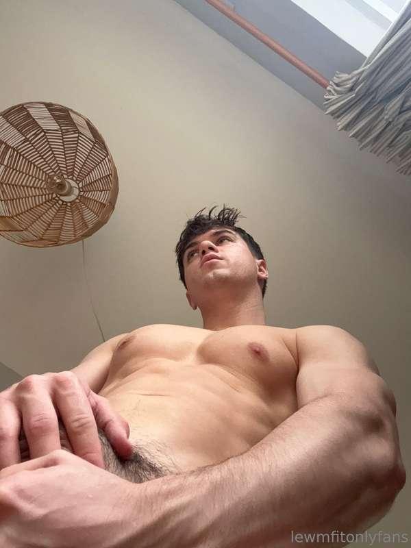 Hard against my abs 
