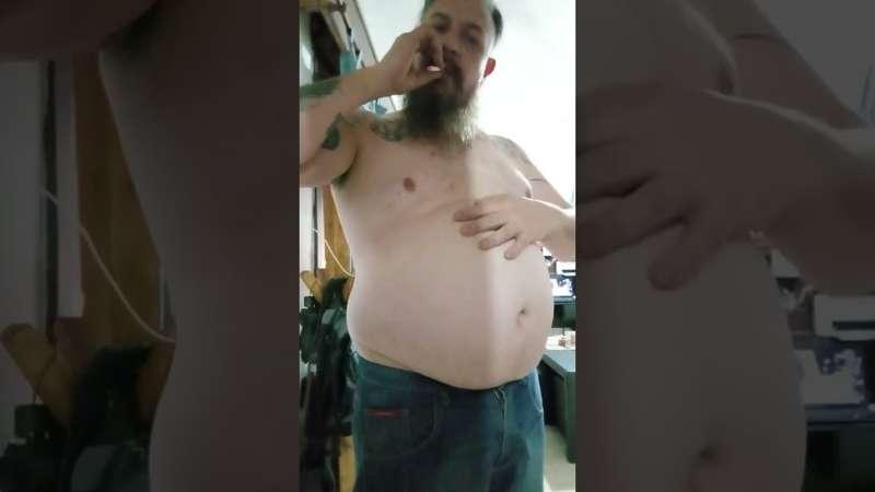 Full belly in tight jeans