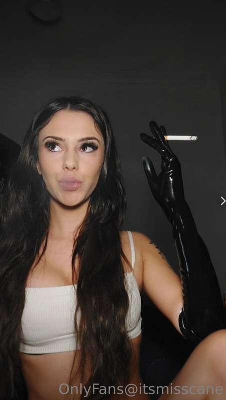 Bossy dom smoke telling you off for being a bad sub in latex..