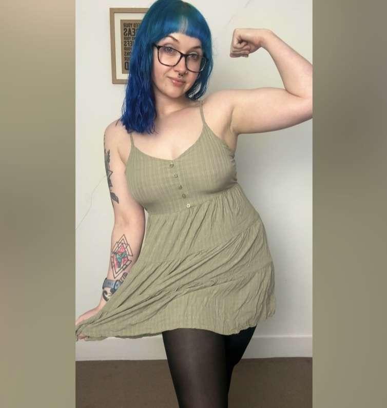 can never resist a flex in a dress